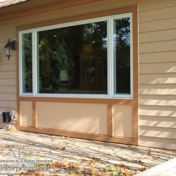 Andersen Windows & HardieTrim. White Windows with Brown Trim in Naperville