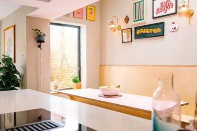 Example of an eclectic dining room design in Other