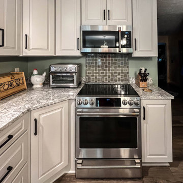 Two Tone Kitchen with Irish Creme Cabinets and Rustic Dockside Island
