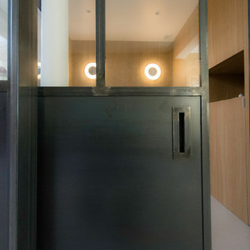 Chambre verrière dans loft parisien