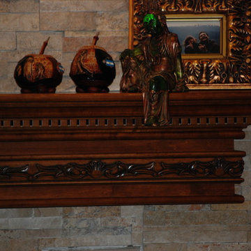 Ornate fireplace mantel with glazed finish to highlight the beautiful details.
