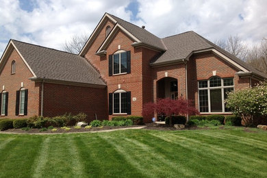 Example of a minimalist exterior home design in Columbus