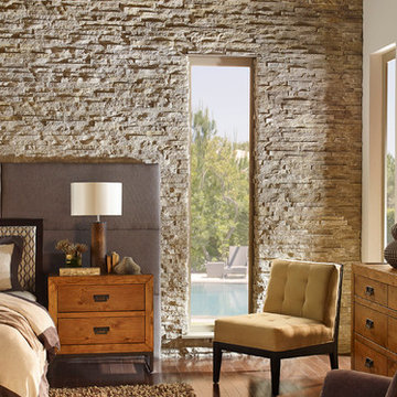 Neutral Bedroom With Stone Accent Wall