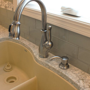 Alpha, IL White and Gray Kitchen with Hidden Laundry and Raised Dishwasher