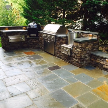Outdoor Kitchen with built-in Big Green Egg & Grill on a flagstone Patio VA