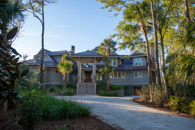 Entryway - huge craftsman entryway idea in Charleston with gray walls and a dark wood front door
