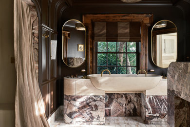 Cette image montre une salle de bain principale traditionnelle de taille moyenne avec un mur marron, un sol en carrelage de terre cuite, un plan de toilette en granite, un plan de toilette blanc, meuble double vasque, meuble-lavabo encastré, une grande vasque et du lambris.
