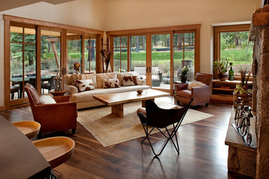 Large elegant open concept medium tone wood floor living room photo in San Francisco with a stone fireplace