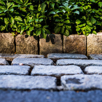 Millstone curbing lines the drive.