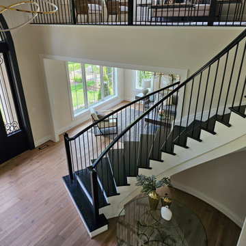 Project #130 | Curved Staircase with Wraparound Balcony
