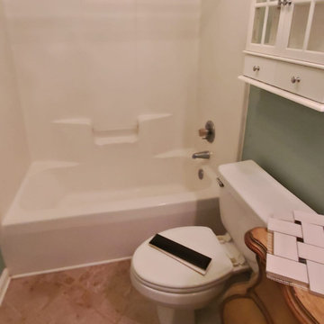 Before – Outdated Bathroom Layout