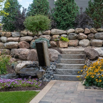 A Landscaper's Dream | Boulder Retaining Wall & Path