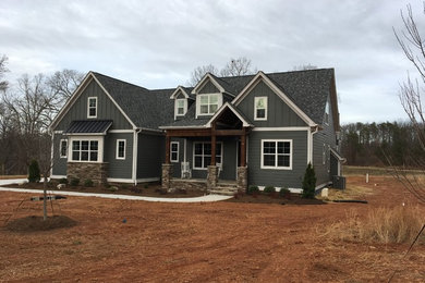 Photo of an arts and crafts home design in Charlotte.