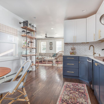 Kitchen open to living, pot rack — Southie, Reno interior design by Find Design