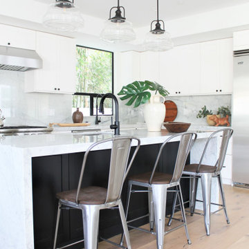 Tolix Counter-Height Bar Stools in Contemporary Farmhouse Kitchen in Los Angeles