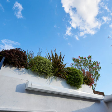 Aménagement d'une terrasse dans l'esprit terracotta