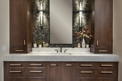 Inspiration for a large contemporary master green tile and stone tile porcelain tile, pink floor and double-sink bathroom remodel in Oklahoma City with shaker cabinets, brown cabinets, beige walls, an integrated sink, quartz countertops, gray countertops and a floating vanity