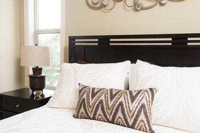 Mid-sized trendy master carpeted bedroom photo in Vancouver with beige walls