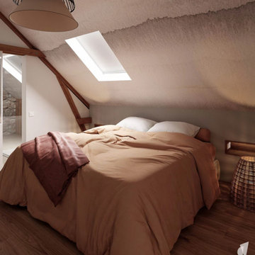 Suite parentale sous combles avec lanternes en tête de lit et papier peint