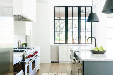 Inspiration for a modern kitchen remodel in Austin with an island and gray countertops
