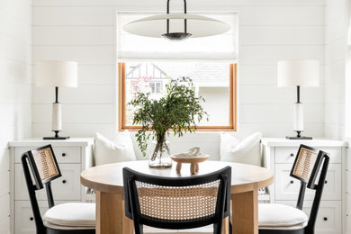 Example of a beach style dining room design in Vancouver