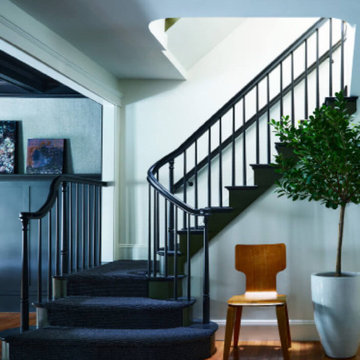 Eclectic Staircase with Dark Green Paint and Charcoal Runner
