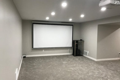 Home theater - modern home theater idea in Toronto