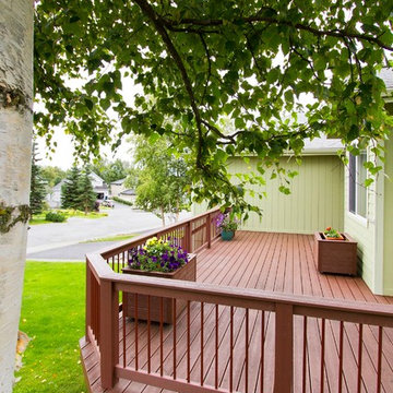 Charming Front Porch with Matching Flower Boxes and Multi-Level Walkway