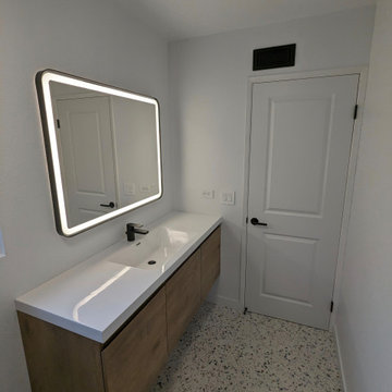 Ultra-Modern Smart Bathroom with Terrazzo Floor & Oval Soaking Tub
