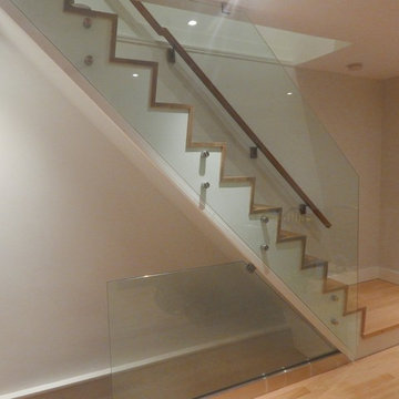 Open-Concept Ground Floor Reno with Customized IKEA Kitchen and Custom Staircase