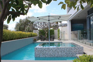 This is an example of a mid-sized modern pool in Perth.