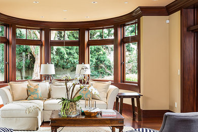 Large transitional open concept and formal dark wood floor living room photo in San Francisco with yellow walls, no fireplace and no tv