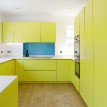 Yellow handleless kitchen