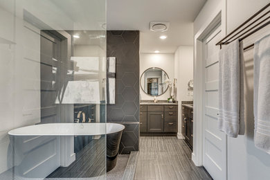 Bathroom - modern master black and white tile and porcelain tile gray floor, single-sink and porcelain tile bathroom idea in Dallas with shaker cabinets, dark wood cabinets, an undermount sink, multicolored countertops, white walls and a built-in vanity