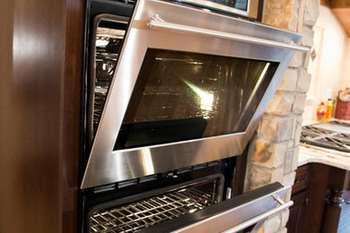 Inspiration for a rustic kitchen remodel in Denver