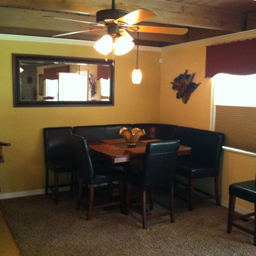Front room after remodel with cordless lift cell shade with decorative cornice