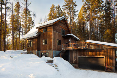 Rustic exterior home idea in Other