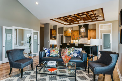 Inspiration for a mid-sized craftsman light wood floor living room remodel in Wichita