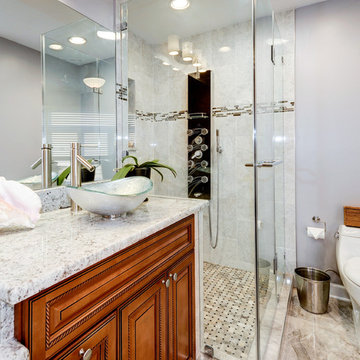 Elegant Master Bathroom Remodel with Quartz-Granite Hybrid Vanity and Spa Shower
