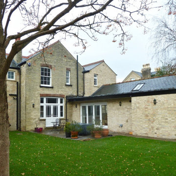 Contextural brick extensions to Cambridge Townhouse & newbuild Annex