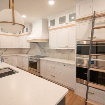 Modern and Bright Kitchen with Floor to Ceiling Storage and Rolling Ladder