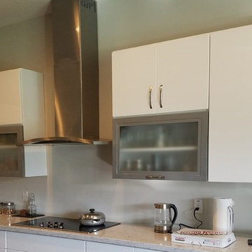 Contemporary Kitchen Update Done In A Reflection White Gloss