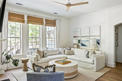Example of a beach style living room design in Charleston