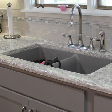 White Upper Cabinet and Gray Base Cabinet Kitchen With Quartz Counters