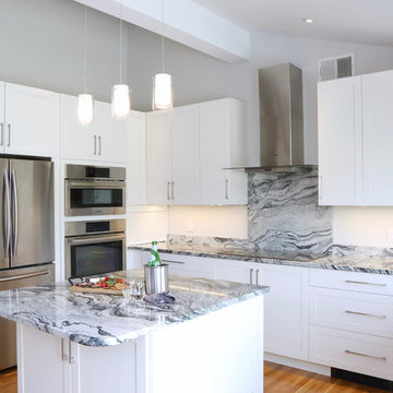 White and Granite Modern Kitchen with stainless steel appliances