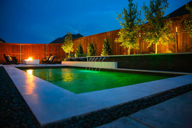Inspiration for a contemporary pool remodel in Dallas