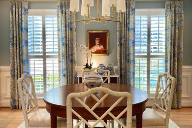 Inspiration for a timeless wainscoting dining room remodel in Raleigh