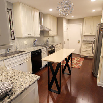 Medallion Painted White Chocolate Kitchen Cabinets with Petal Mosaic Backsplash