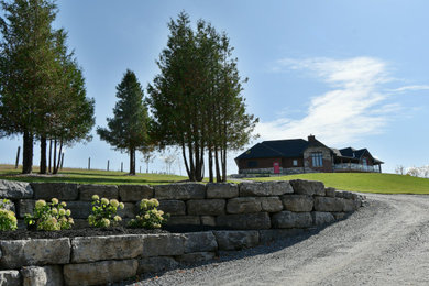 Farmhouse home design photo in Toronto