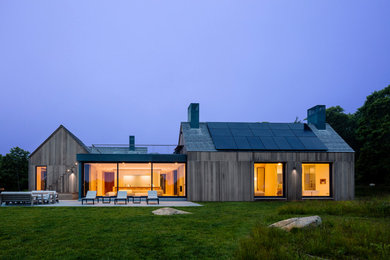 Example of a beach style exterior home design in Boston